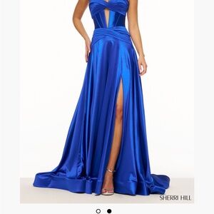 Strapless corset A-Line gown with a keyhole and high slit.Style # 56396